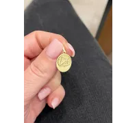 Zlatý prívesok 1562